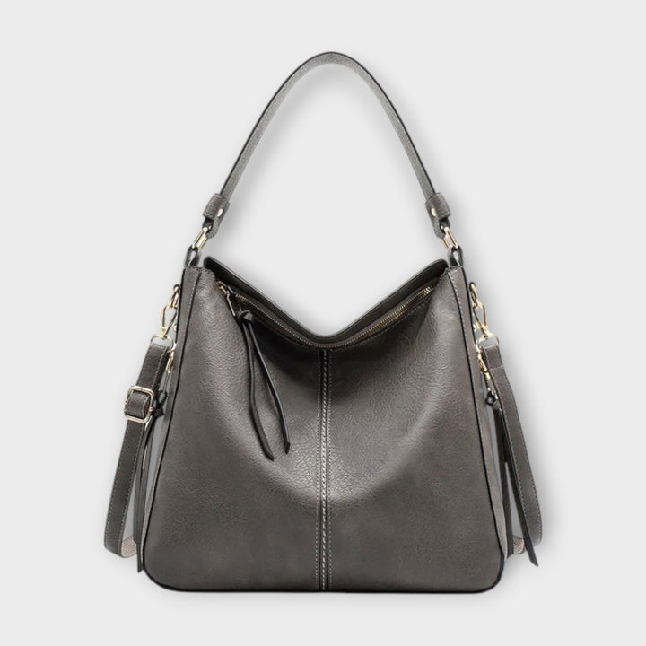 Detailed view of the hardware on a women's slouchy hobo crossbody bag, showcasing quality craftsmanship