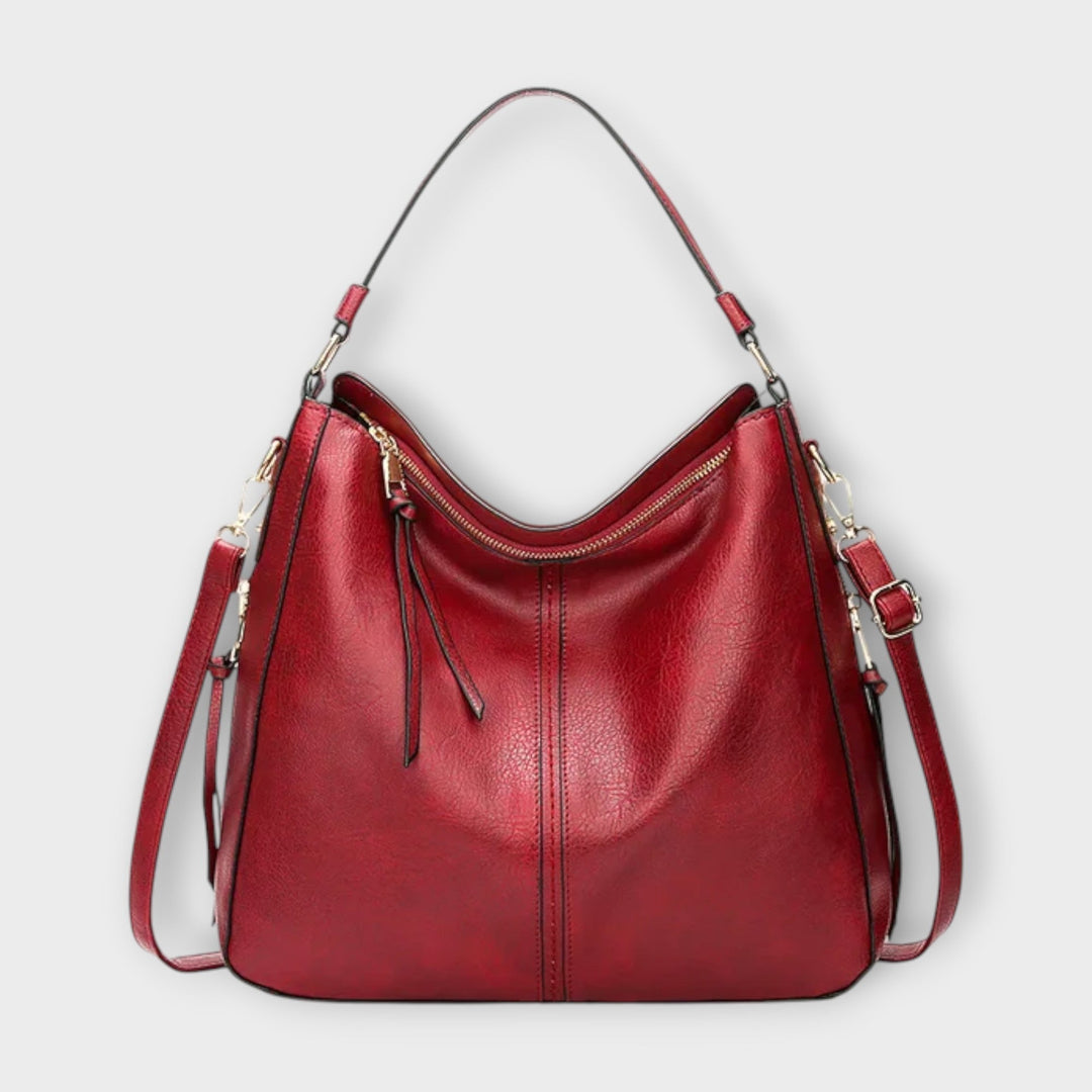 Versatile black faux leather slouchy hobo bag, an essential women's crossbody and shoulder bag