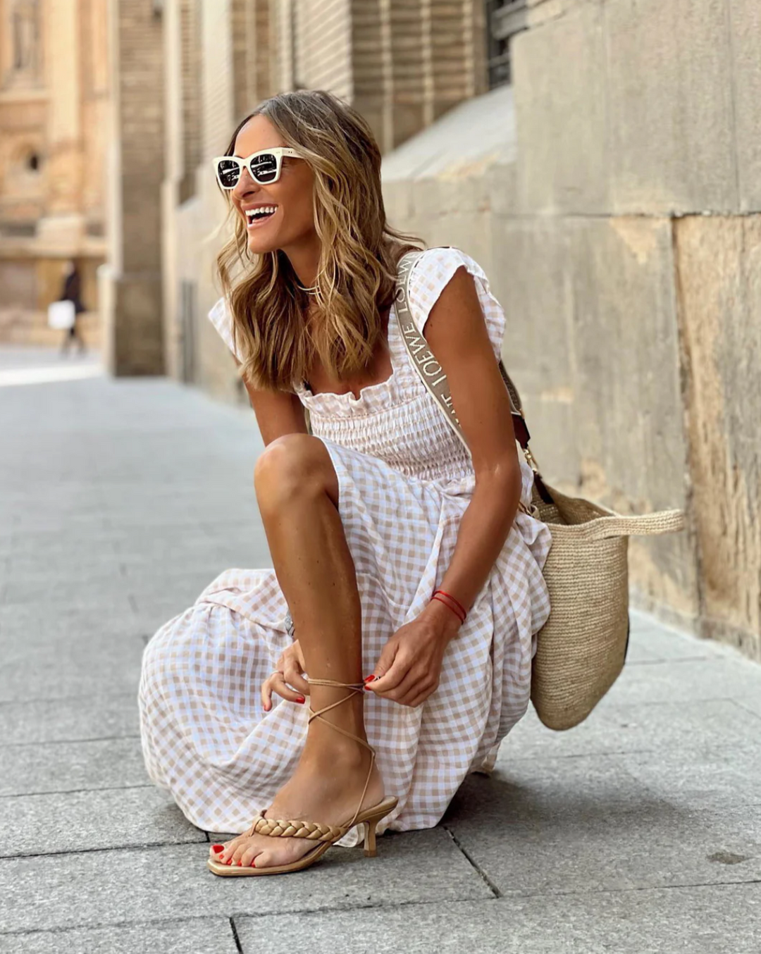 Comfortable women's smocked maxi dress with elegant design, ideal for casual wear.