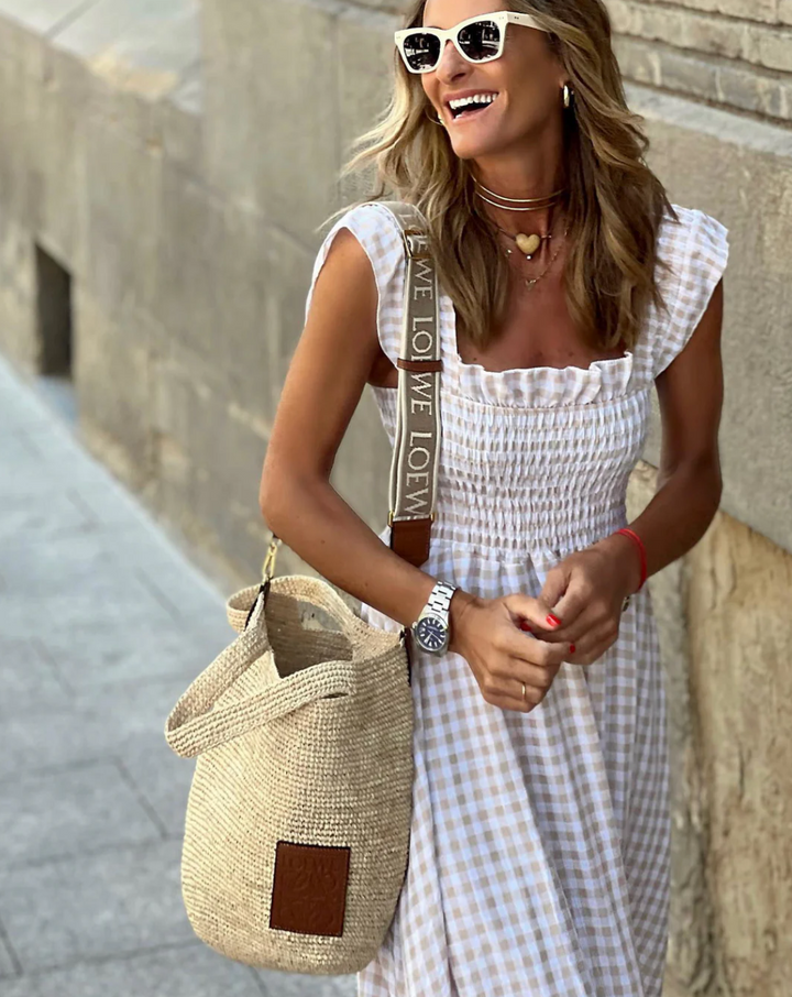 Casual event women's maxi dress, smocked detailing, comfortable and stylish.