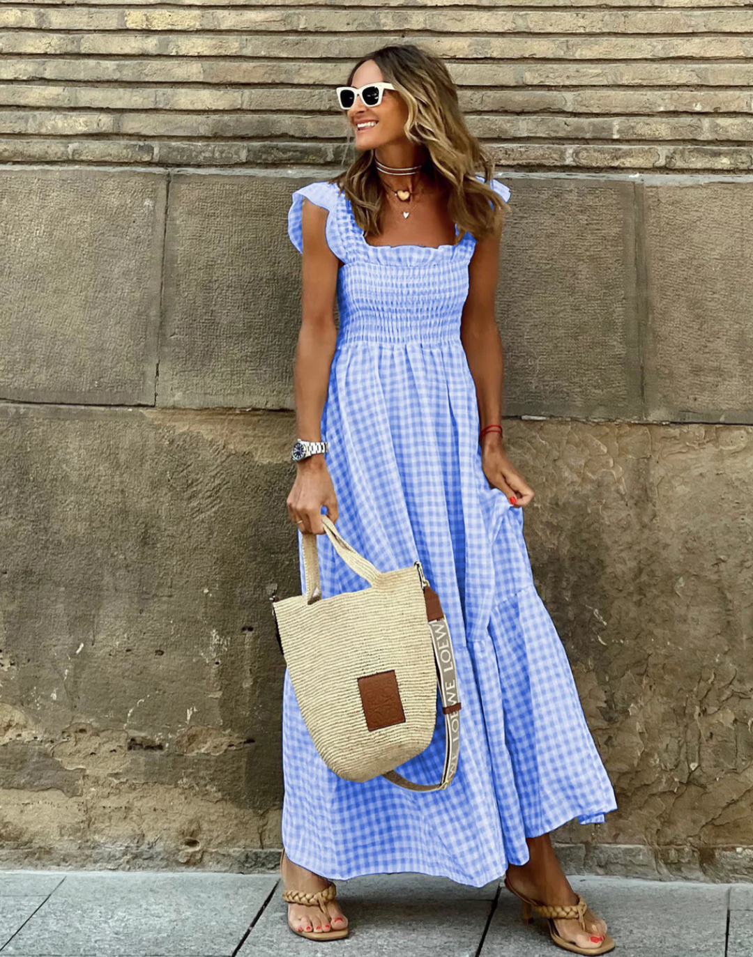Elegant women's smocked maxi dress, perfect for warm weather and various occasions.
