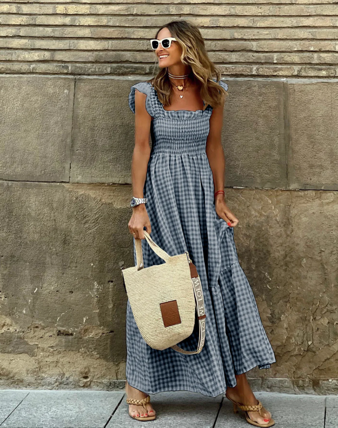 Fashionable women's smocked maxi dress in a breathable fabric for all-day comfort.