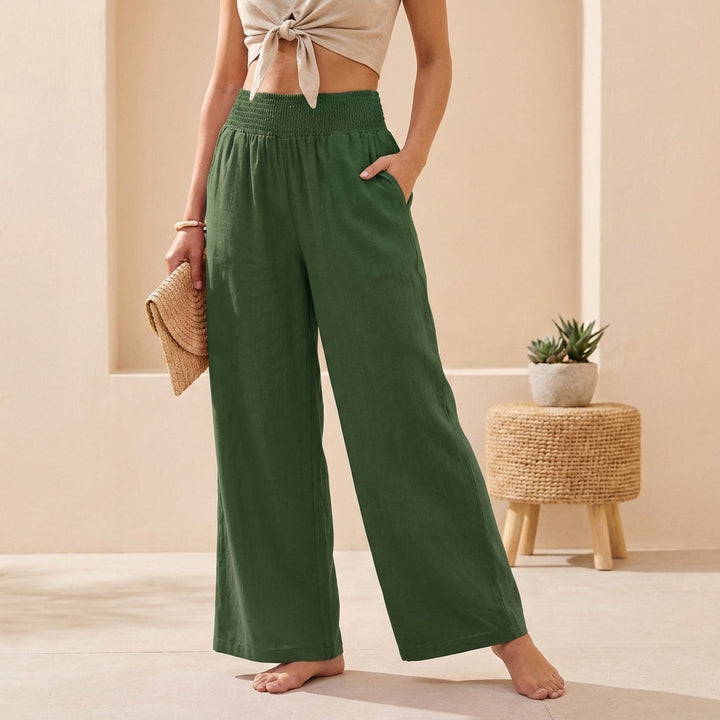 Comfortable wide-leg smocked pants for women. Perfect for summer fashion, vacation, or elegant daily wear.