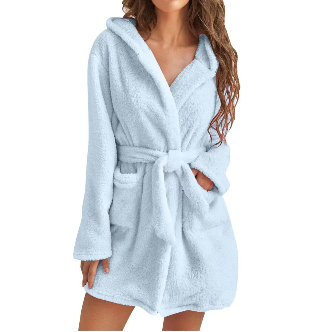 Snuggly women's fleece hooded robe, perfect for warmth and comfort after a relaxing bath or shower.