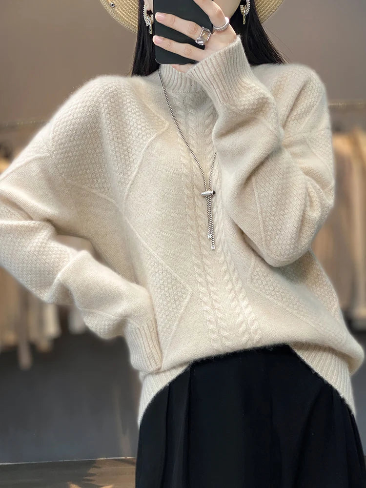 Close-up of luxurious women's cashmere roll neck jumper, showcasing the intricate cable knit texture.