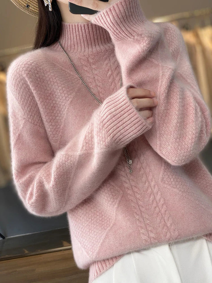 Stylish women's pink cashmere roll neck jumper, featuring a cozy cable knit design for ultimate warmth & comfort.