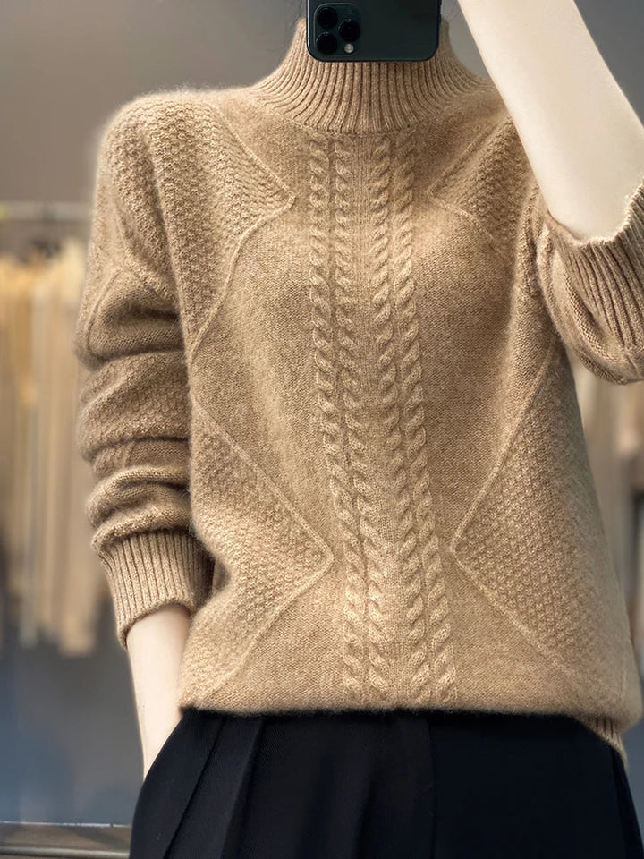 Luxury women's cashmere roll neck jumper in a stylish cable knit, an elegant top for fashionable winter outfits.