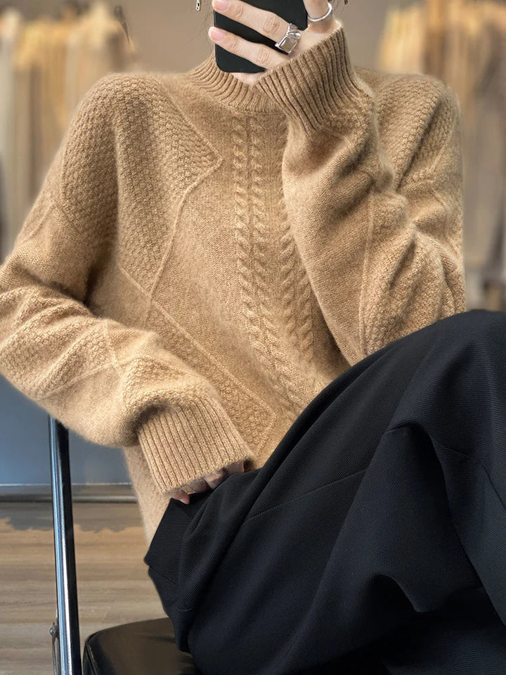 Women's elegant beige cashmere roll neck jumper, a comfortable cable knit sweater for sophisticated winter fashion.