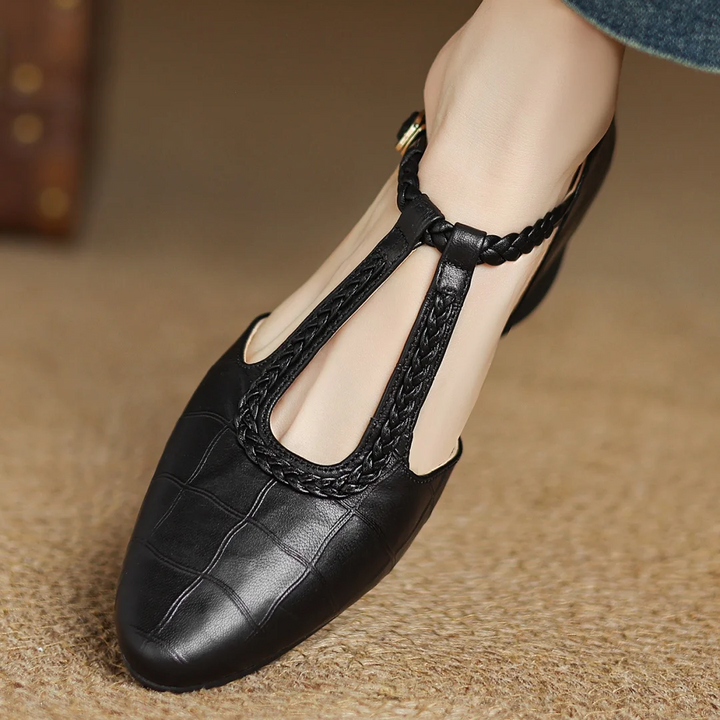 Overhead shot of women's soft leather T-strap Mary Janes, highlighting the shoe's classic shape