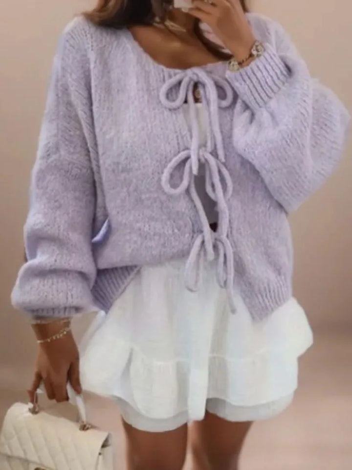 Elegant bow tie women's cardigan; a soft knit sweater, ideal for versatile and stylish layering.