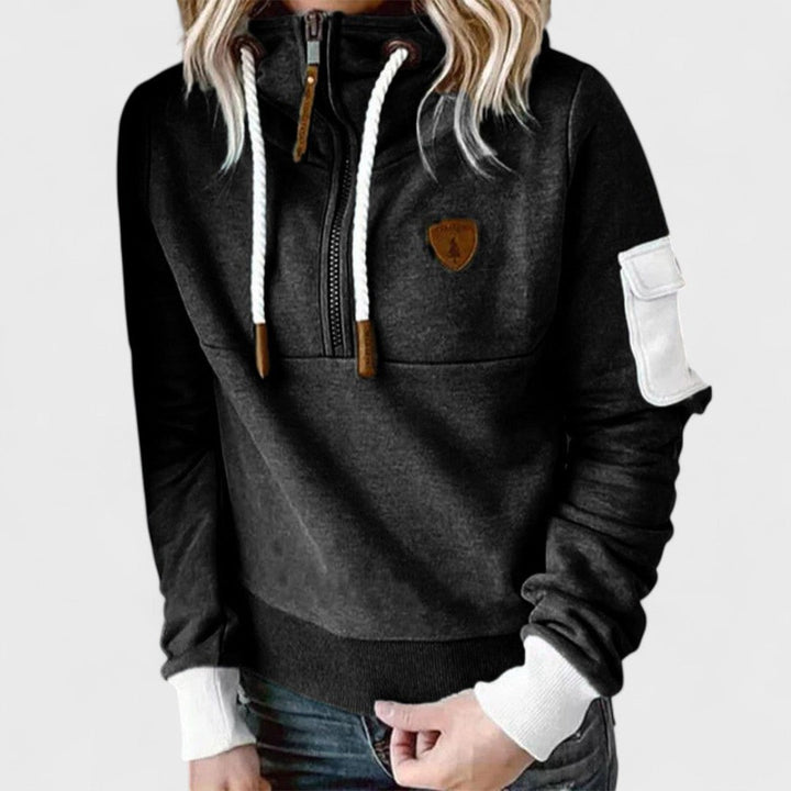 Stylish women's soft jumper in burgundy, featuring a golden zip neck, perfect winter fashion