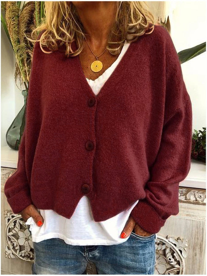 Long-sleeve open-front knit cardigan for women, delivering comfort and a fashionable layered look.