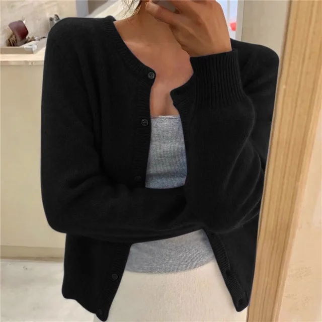 Beige women's knit cardigan, relaxed fit with buttons, ideal for fall and spring fashion.