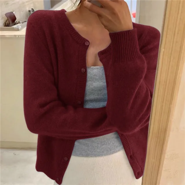 Front view of a women's relaxed fit button-up knit cardigan, highlighting its soft fabric and style.