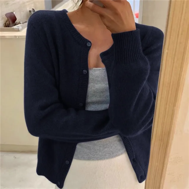 Chic women's button-up relaxed fit cardigan, a cozy and stylish addition to any wardrobe.