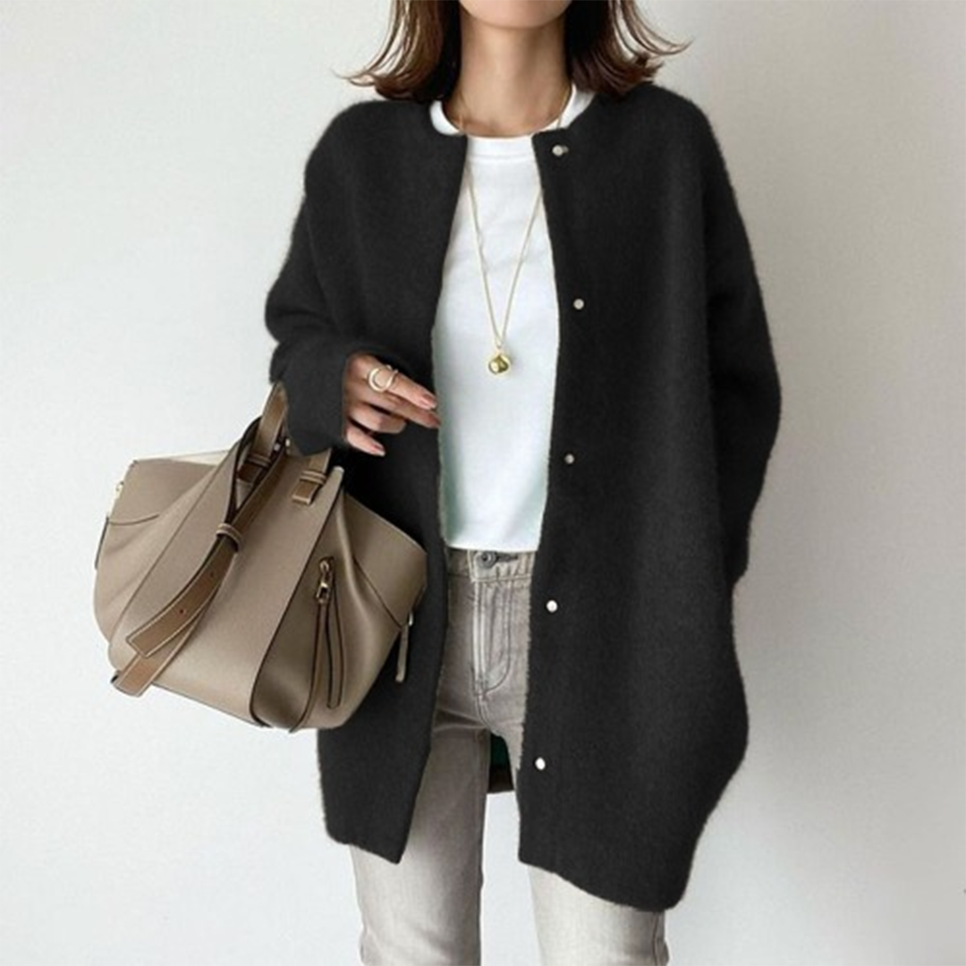 Beige women's relaxed fit long cardigan with button-down front, a cozy winter essential.