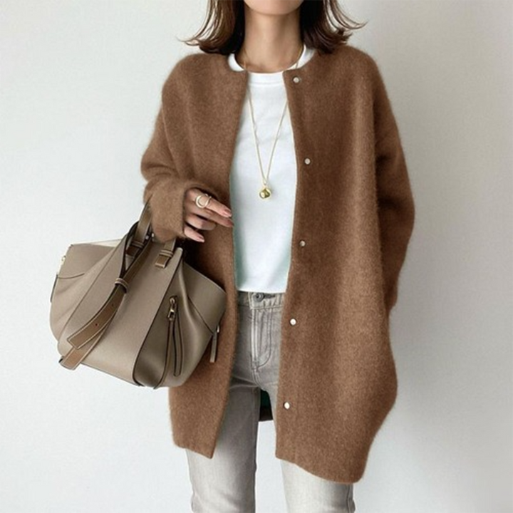 Model wearing a blue soft knit long cardigan, perfect for comfortable everyday casual wear.