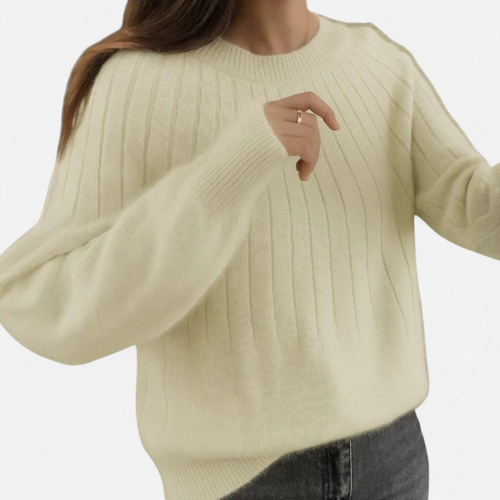 Soft knit pullover sweater for women, elegant and comfortable, ideal for fashion & coziness.