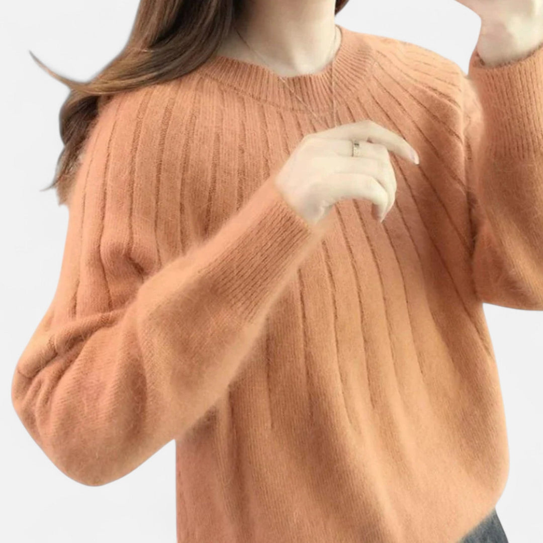 Versatile women's soft knit pullover sweater, elegant for comfortable casual & timeless fashion.