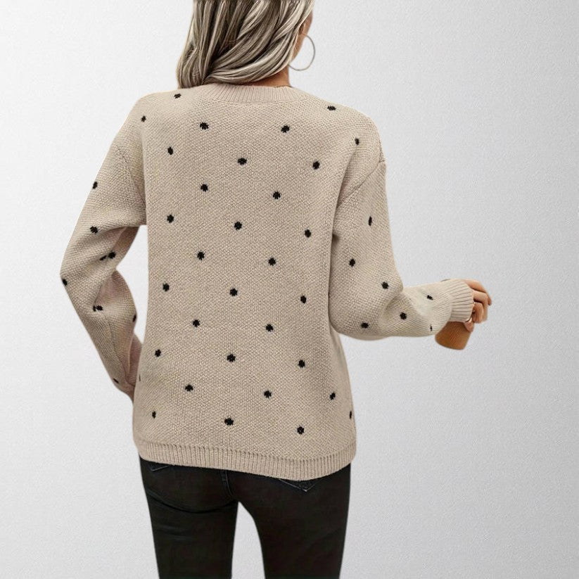 Stylish women's crew neck sweater with polka dot pattern, a cozy and fashionable knitted top for winter