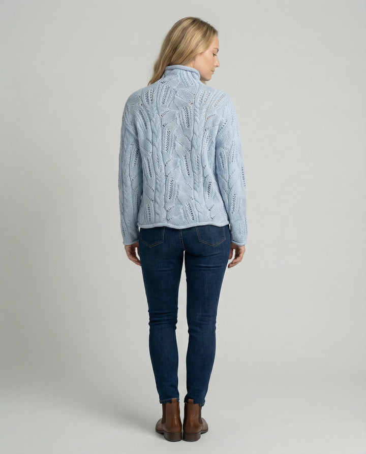 Comfortable women's luxury knit sweater, minimalist and soft for everyday chic. Classic long sleeve winter fashion.