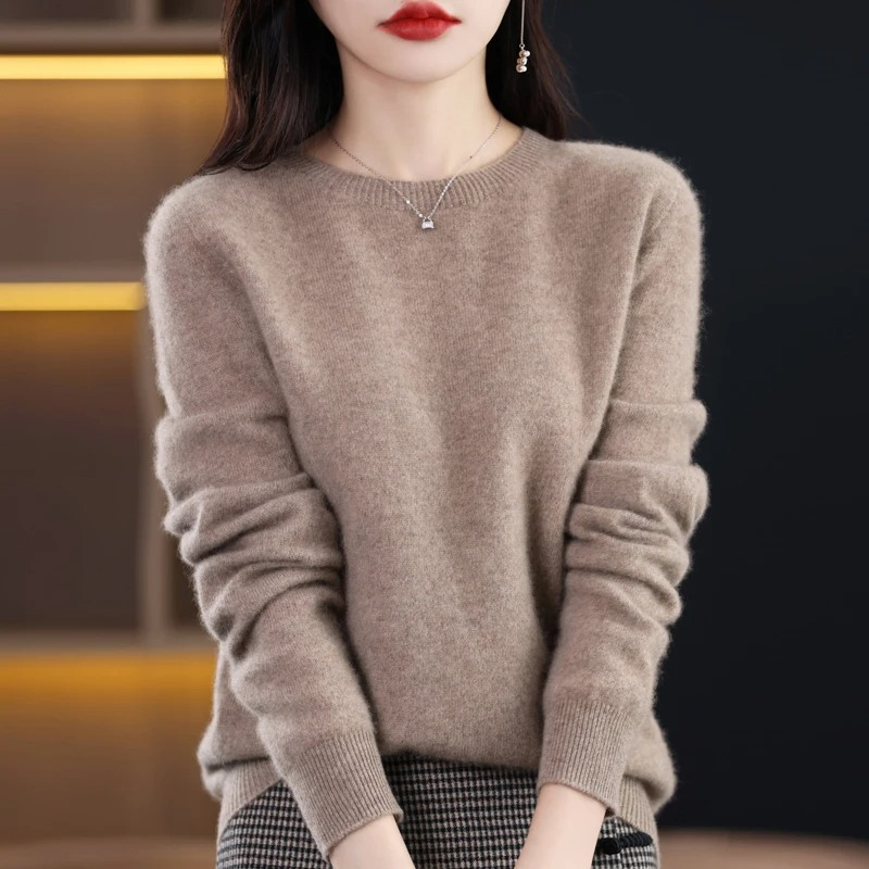 Essential women's warm knit round neck sweater. Soft luxury long sleeve for cozy winter comfort.