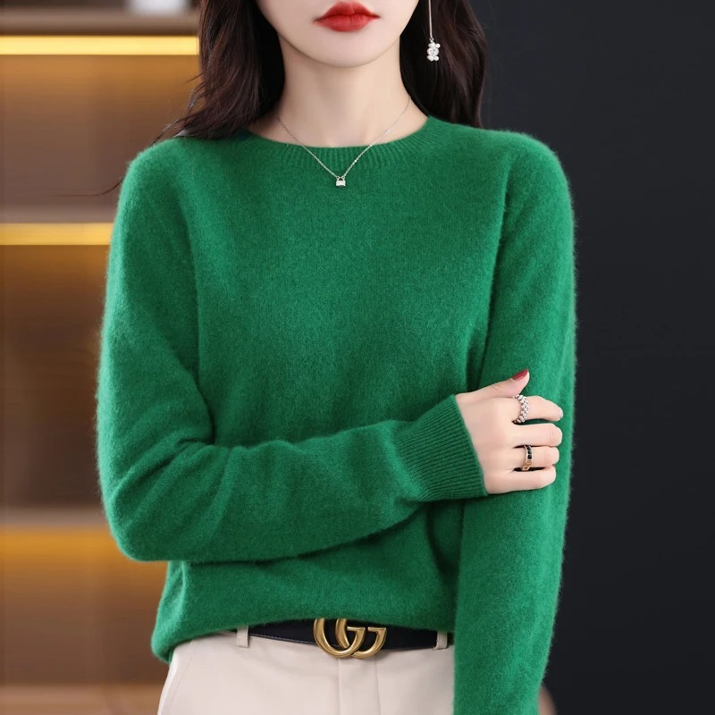 Stylish women's round neck knitwear. Soft luxury sweater, warm long sleeve for elegant winter fashion.