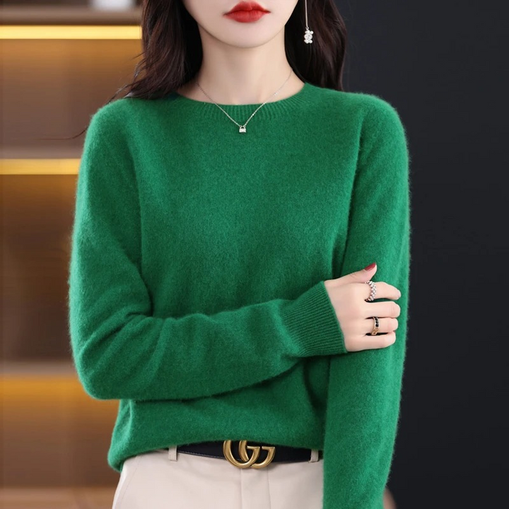 Stylish women's round neck knitwear. Soft luxury sweater, warm long sleeve for elegant winter fashion.