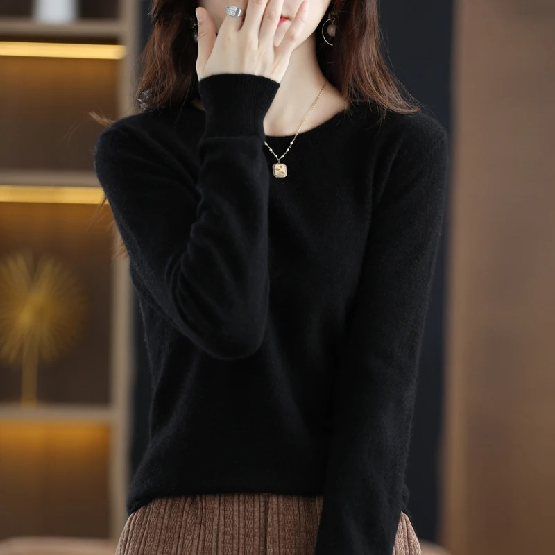 Premium women's warm knit round neck sweater. Soft luxury long sleeve for sophisticated winter style.