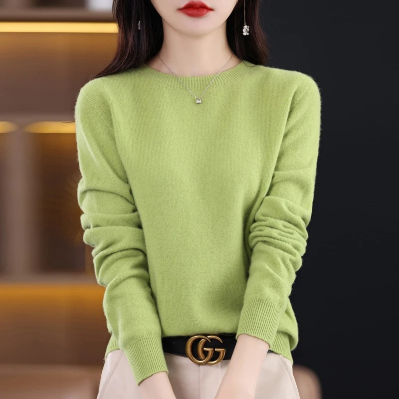 Soft touch women's luxury round neck sweater. Warm knitwear, elegant long sleeve for winter comfort.