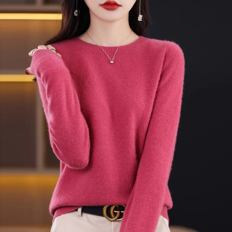 High-quality women's warm round neck sweater. Soft luxury knit, long sleeve for elegant winter fashion.
