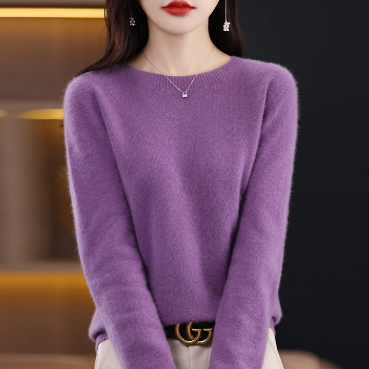 Durable women's warm knit round neck sweater. Soft luxury fabric, long sleeve for lasting winter style.
