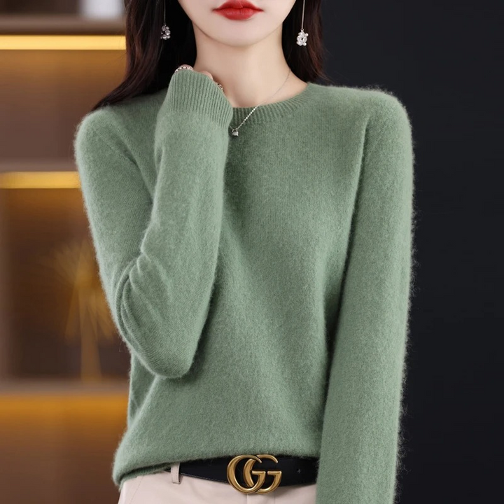 Front view of women's soft luxury knit round neck sweater. Warm and stylish for winter comfort.