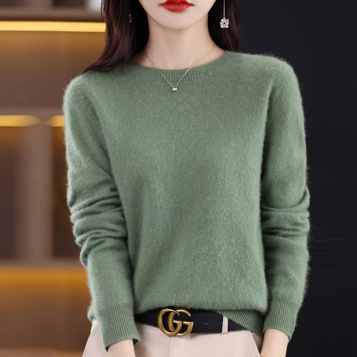 Versatile women's soft knit round neck sweater. Warm luxury top for elegant winter wear & comfort.
