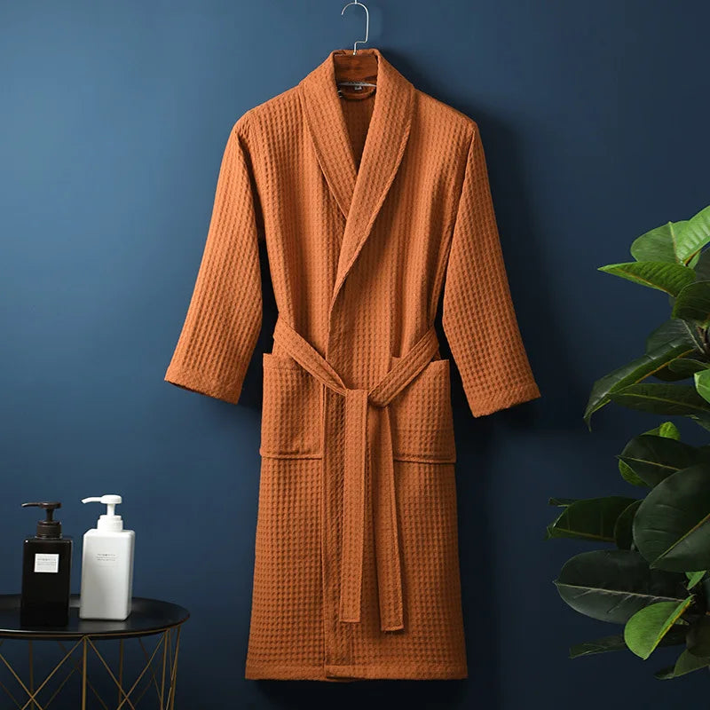 Folded women's waffle robe in a vibrant yellow, ready for spring and summer comfort as lounge wear.