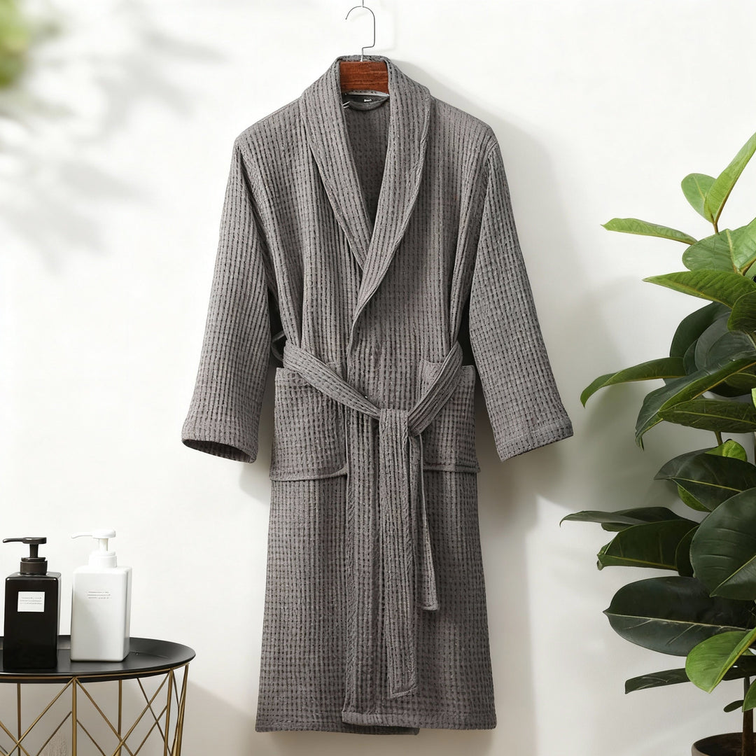 Close-up of a women's waffle lounge robe fabric, highlighting the comfortable texture for spring wear.
