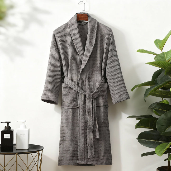 Close-up of a women's waffle lounge robe fabric, highlighting the comfortable texture for spring wear.