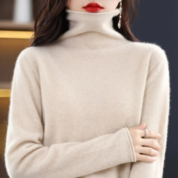 Elegant women's turtleneck pullover, soft and perfect for layering.