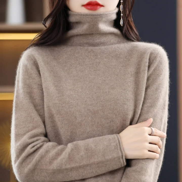 Cozy ladies' turtleneck sweater, long sleeve comfort for winter fashion.