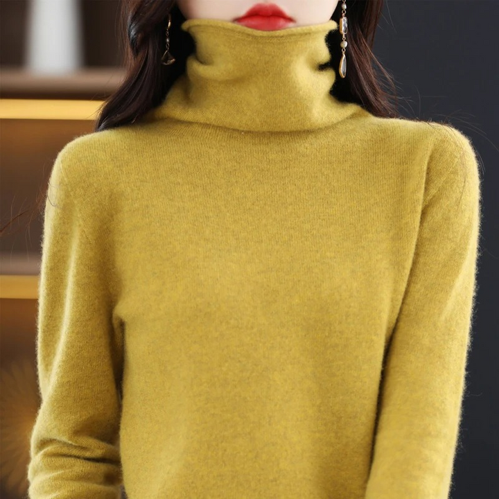 Fashionable women's turtleneck sweater, a cozy essential for autumn days.