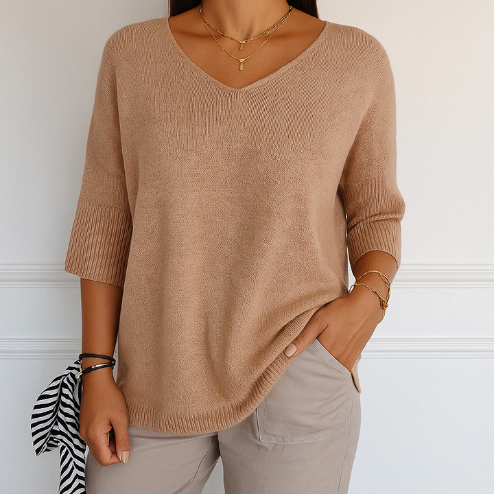 Stylish women's black v-neck short sleeve sweater, perfect lightweight knit for everyday comfort