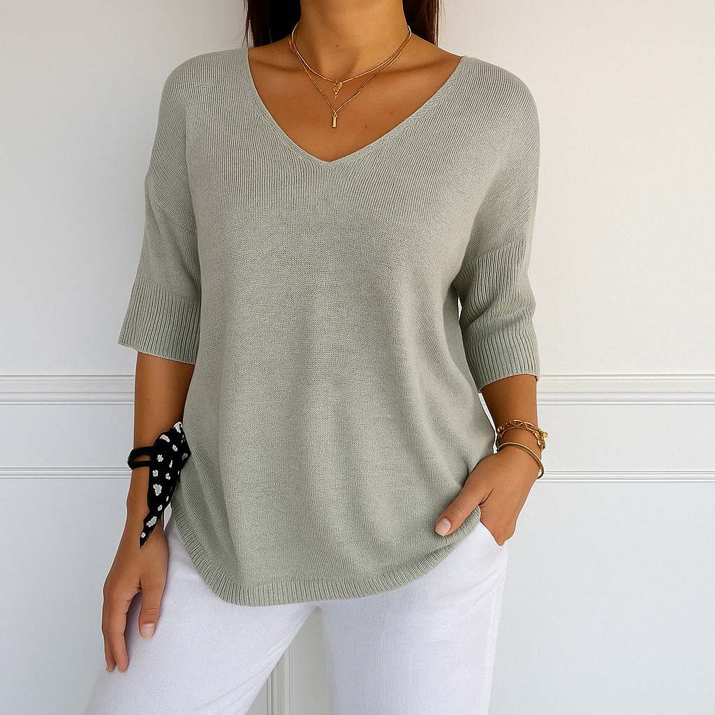 Casual women's blue v-neck short sleeve knit top, ideal lightweight sweater for warm weather