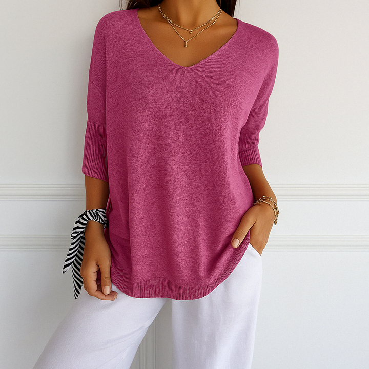 Women's green v-neck short sleeve sweater, a lightweight knit top for casual everyday style