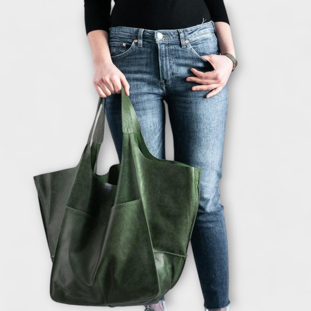 Group of women's spacious classic everyday bags in various neutral tones, showcasing versatility.