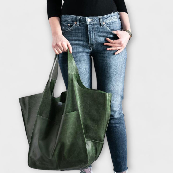 Group of women's spacious classic everyday bags in various neutral tones, showcasing versatility.