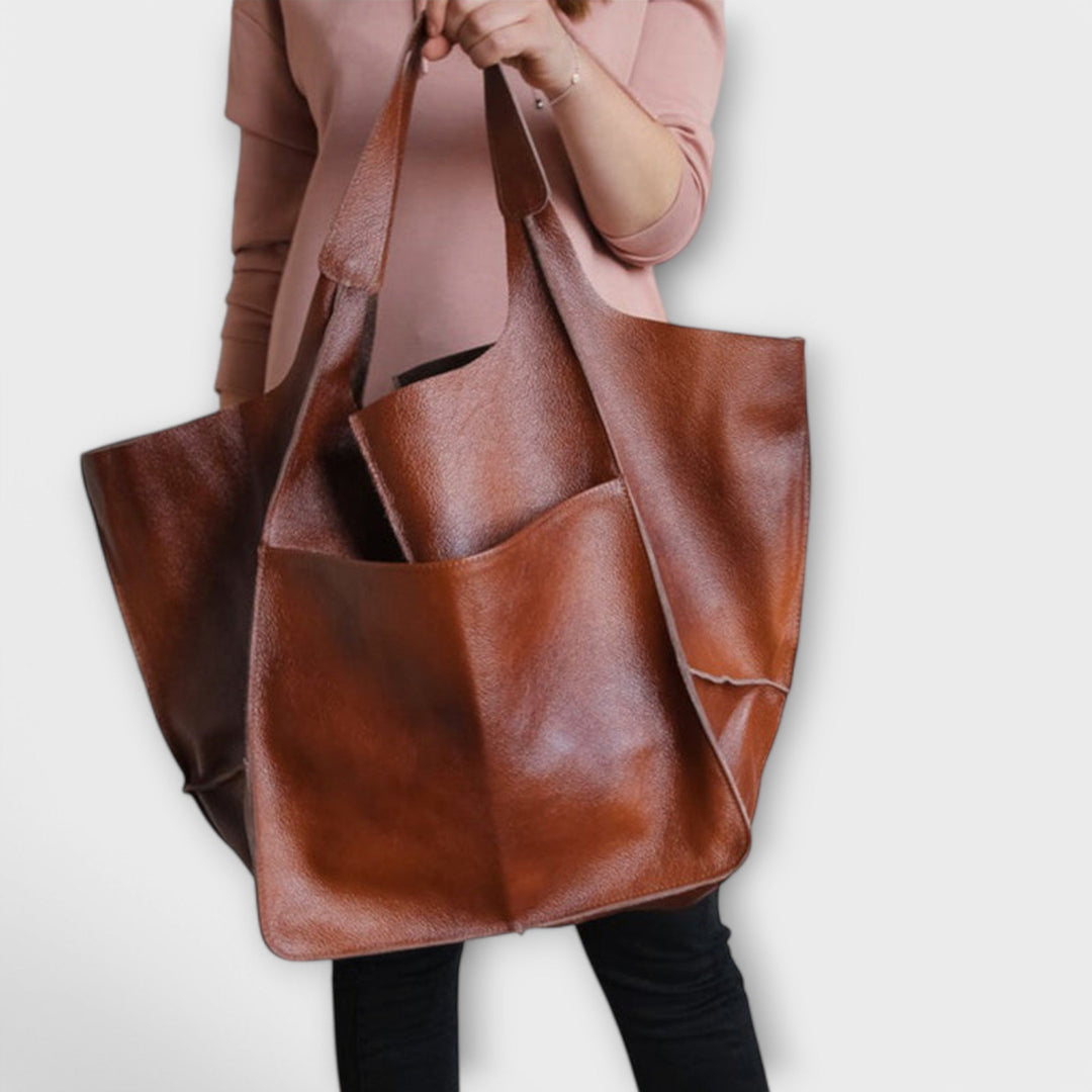 Women's everyday tote bag against a summer backdrop, accentuating its suitability for warm days.