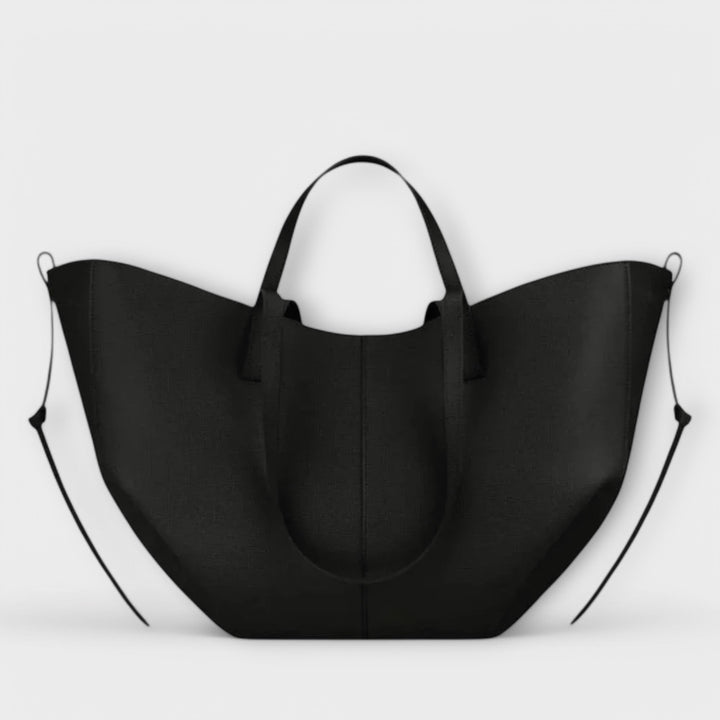 Back view of a women's spacious shoulder tote bag, simple and functional design.