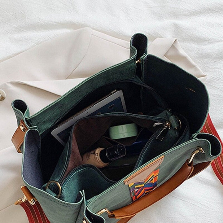 Spacious women's PU leather tote, great for work, travel, or shopping, keeping essentials organized.