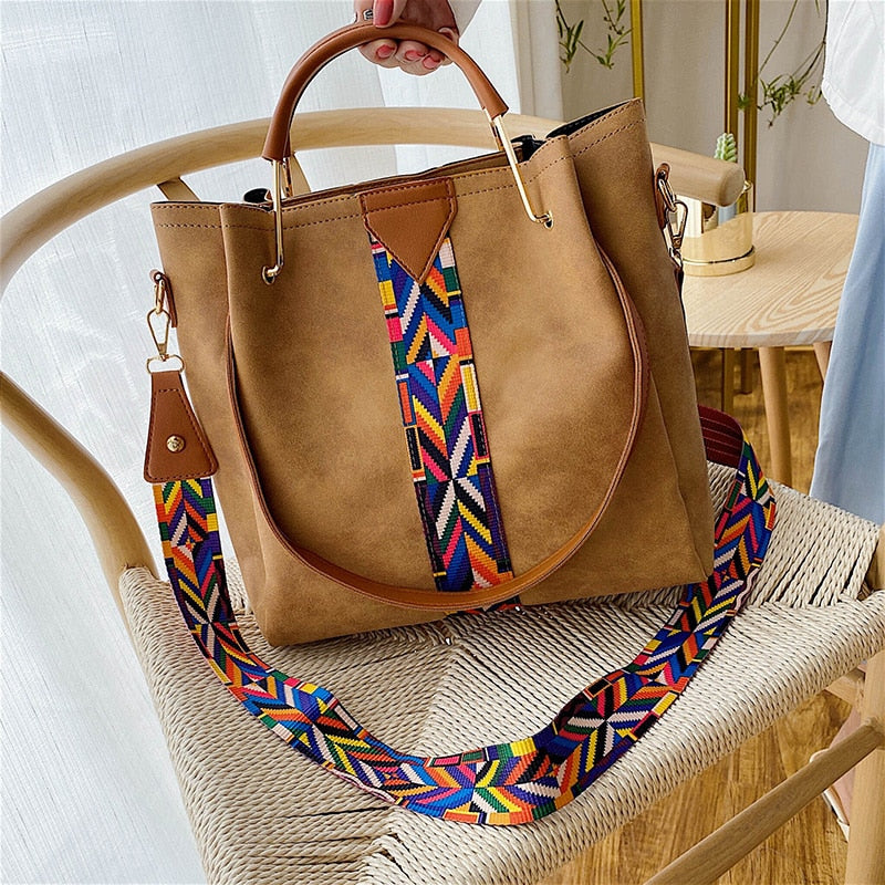 Large capacity PU leather travel tote for women, an everyday carry bag perfect for weekend trips.