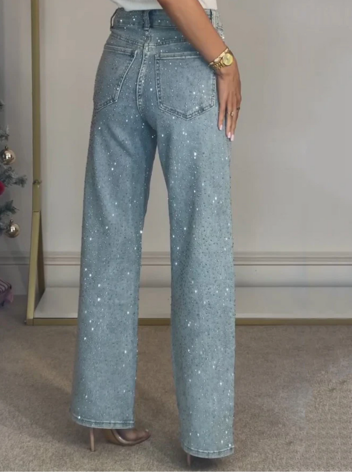 Model wearing women's high-waist straight-leg jeans with sparkle, highlighting the flattering structured fit.